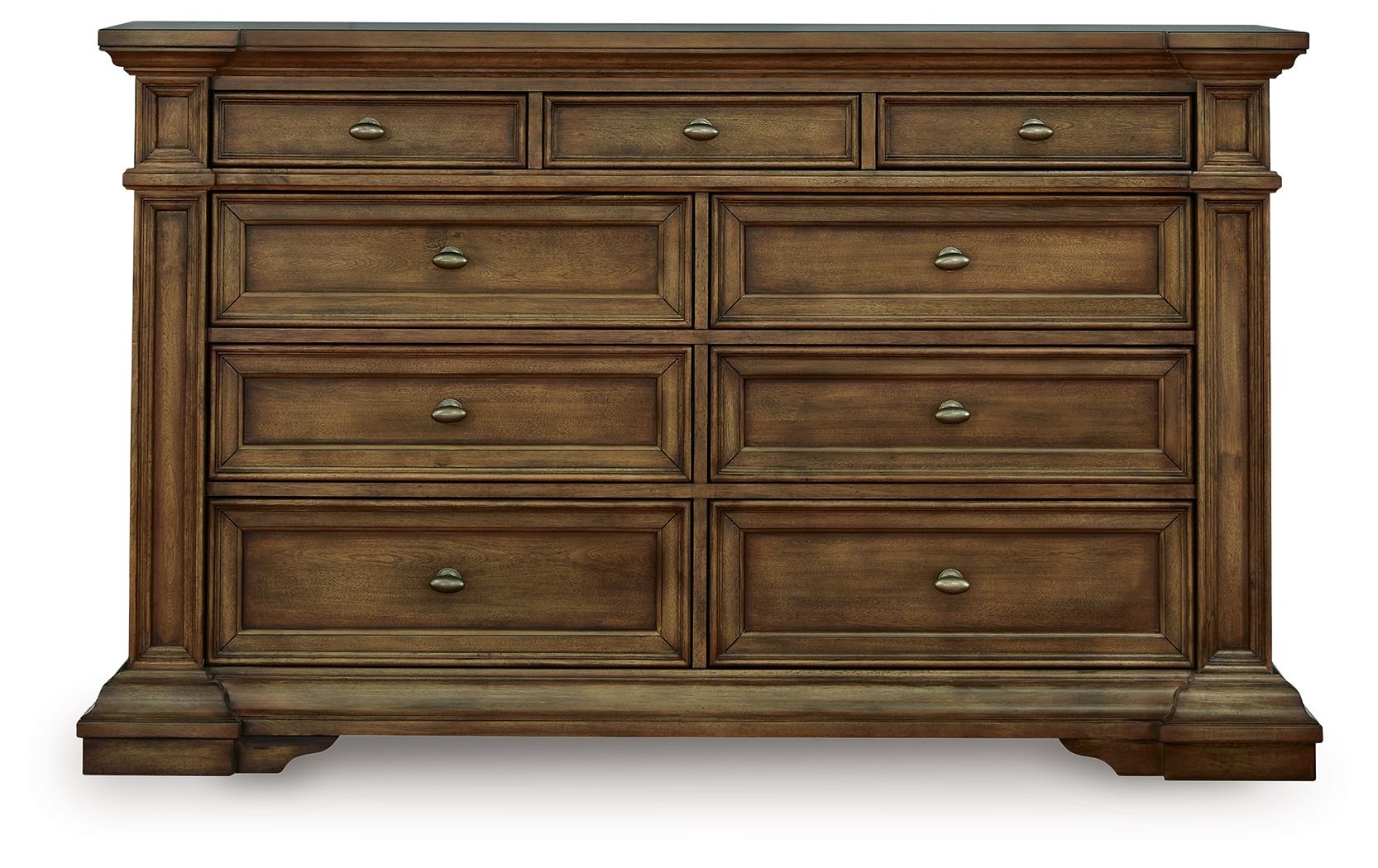 Commode — Des moulures de taille considérable et des poignées en laiton vieilli complètent la pièce avec élégance