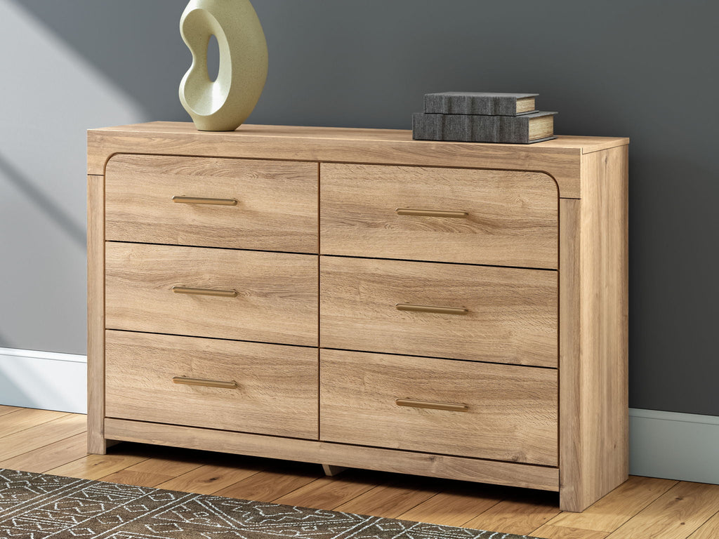 Commode à six tiroirs — Les tons de bois naturels et les lignes épurées de cette commode reflètent votre style décontracté.