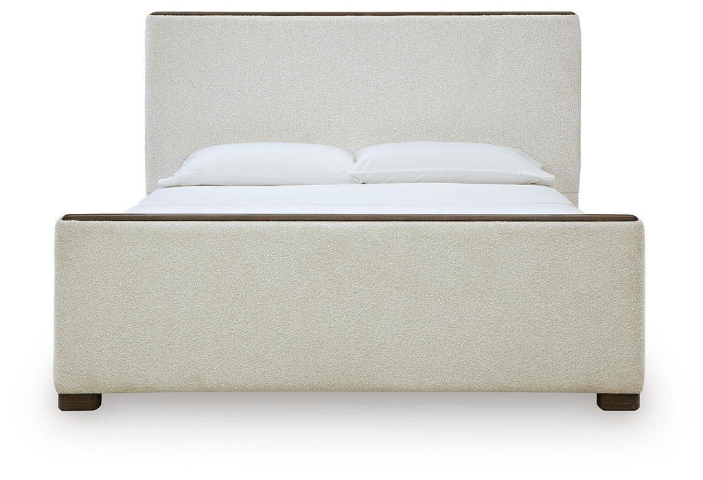 Lit capitonné — Sa silhouette épurée est adoucie par un tissu de type bouclé