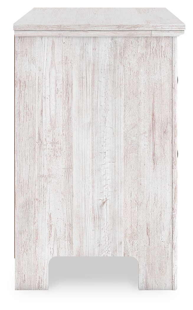 Table de chevet à deux tiroirs — Vous souhaitez créer une chambre aérée et joliment agencée ? Cette table de chevet au confort décontracté est